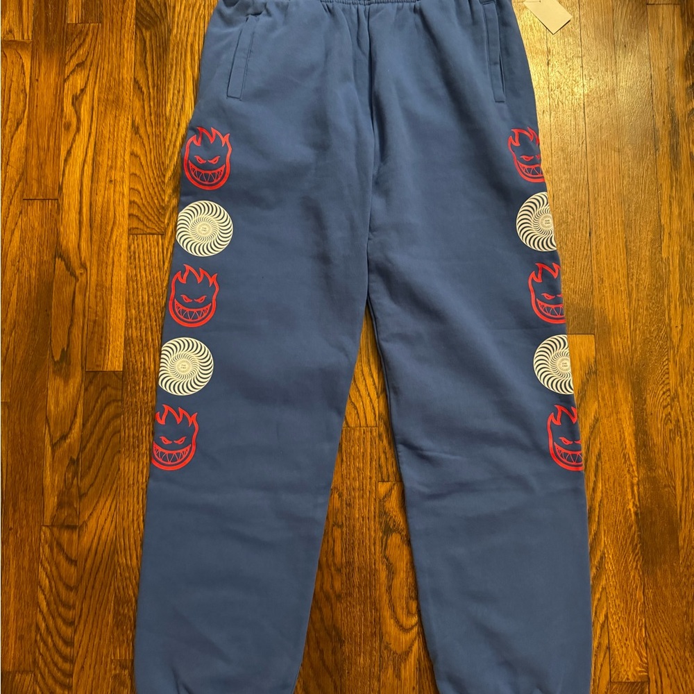 Spitfire Blue Sweatpants with Red and White Graphics